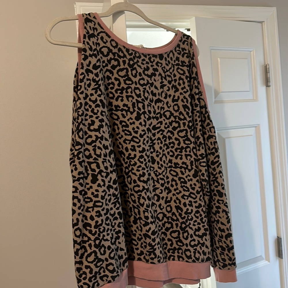 Super cute open shoulder shirt
